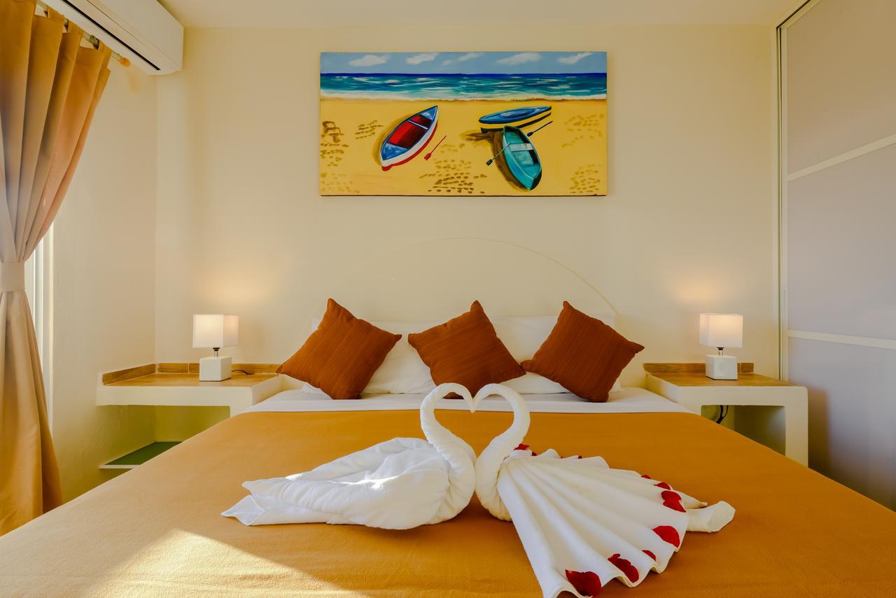 Condo Casa Del Arbol Playa del Carmen Bagian luar foto